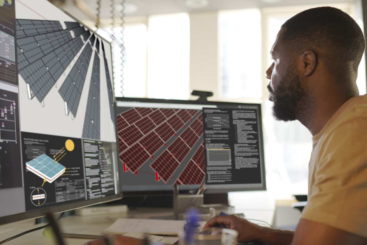 Compliance engineer viewing models on computer